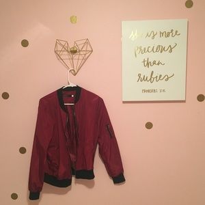 Burgundy bomber jacket with zipper detailing